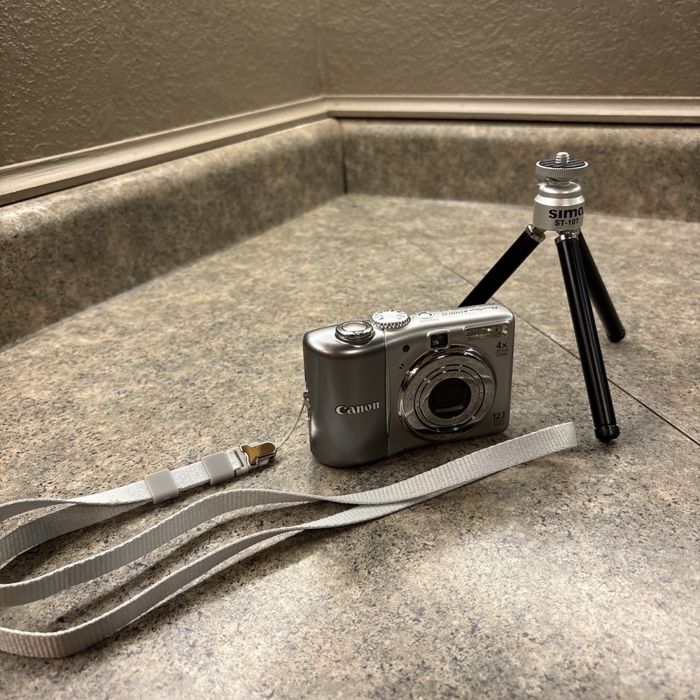 Canon PowerShot A1100 IS 12.1MP Digital Camera silver MINT COND+ Stand & Mem Car - Picture 2 of 13